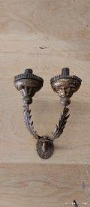 Applique in ferro battuto a 2 luci  due belli raccogli cera in legno laccato e dorato  Veneto Meta' XVIII° sec. h. cm.25